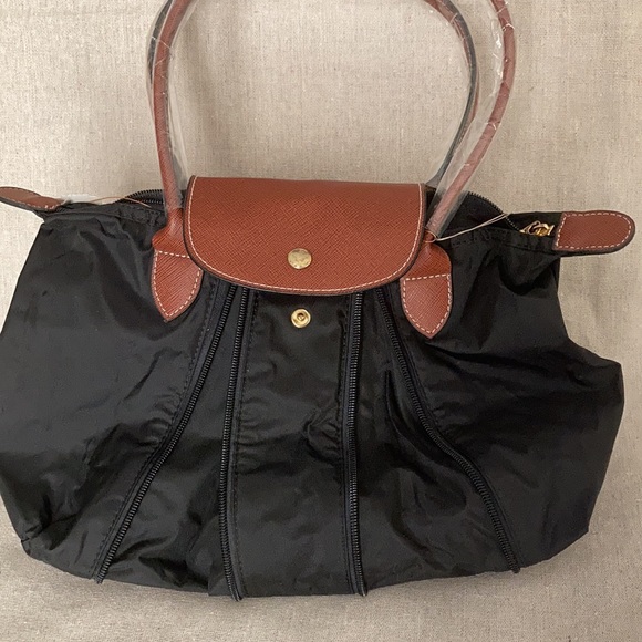 Handbags - Expendable tote bag